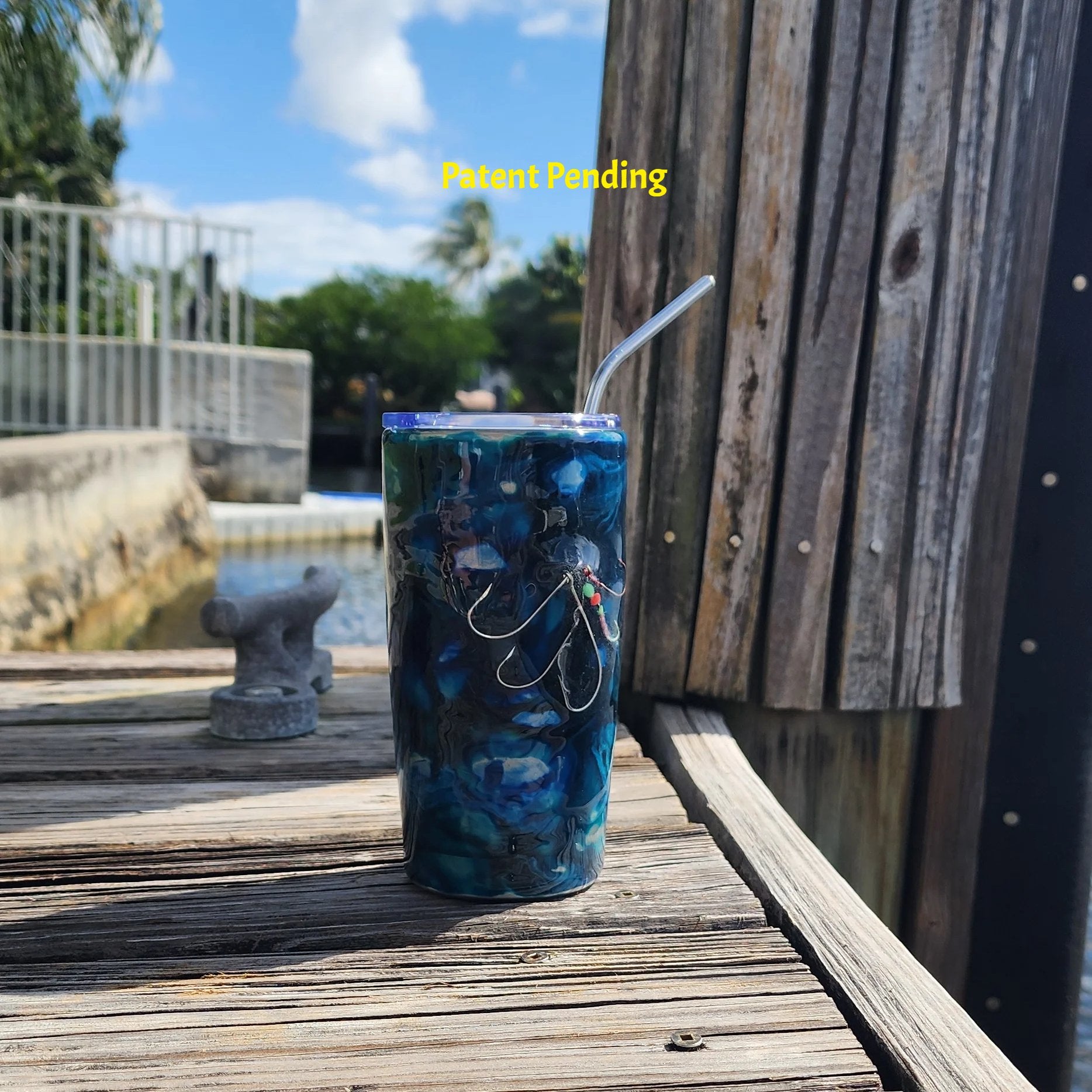 Blue Lagoon fishing hook tumbler 20oz on dock, Patent Pending Hook & Tumble handmade coastal drinkware