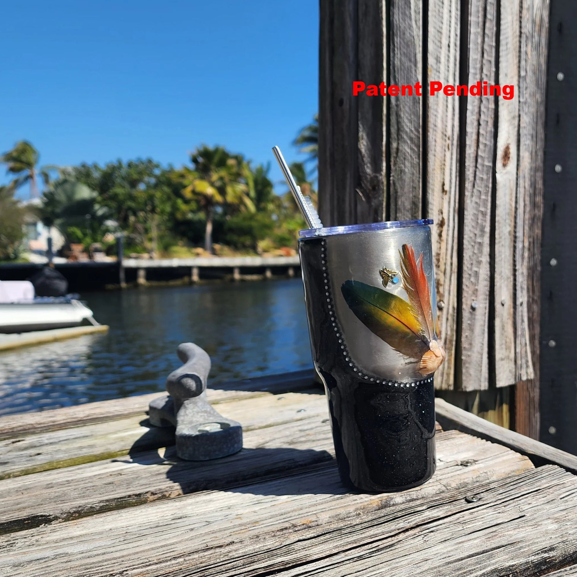 Side view black glitter 30oz tumbler with silver upper finish and feather detail