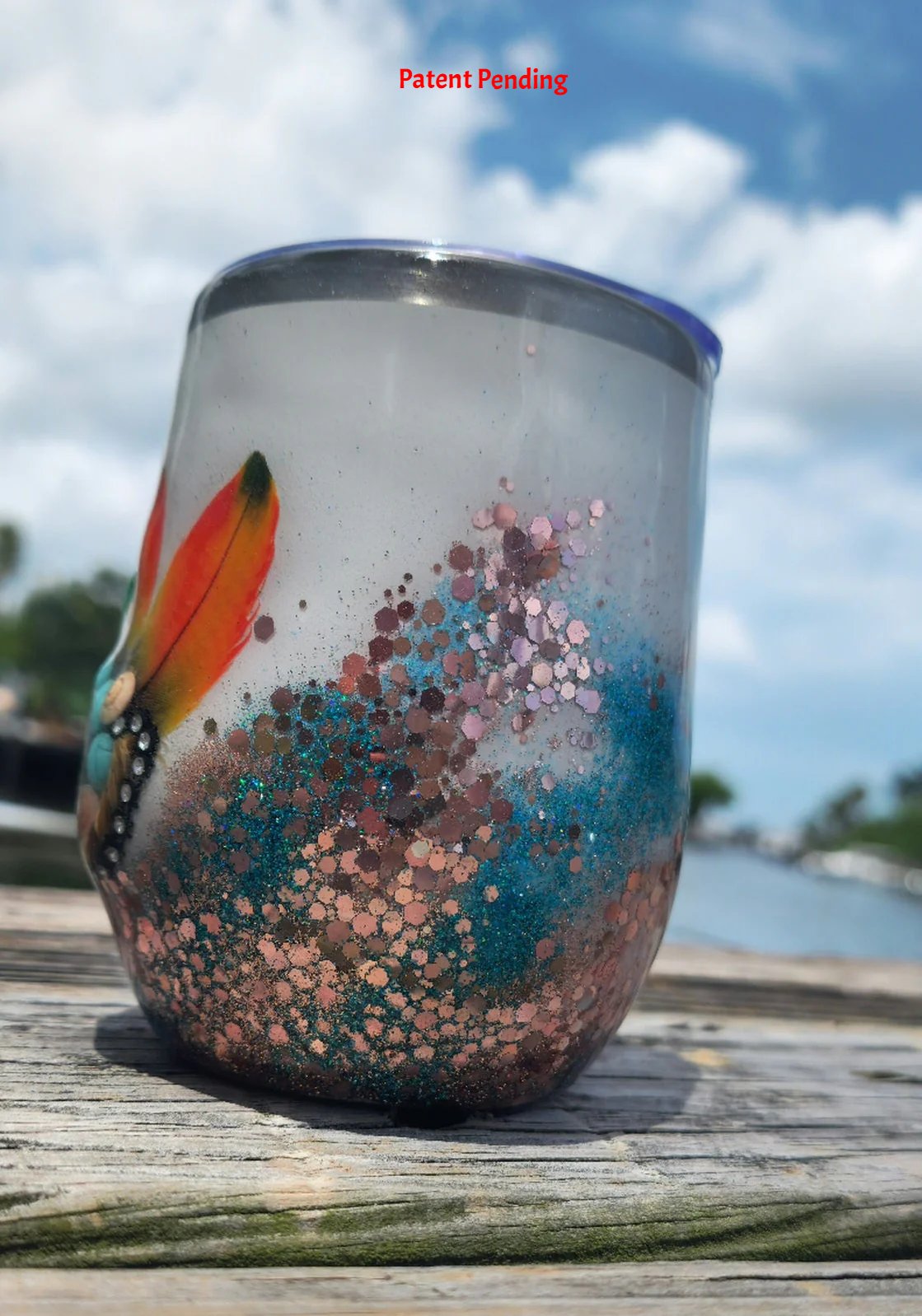 Saltwater Sips coastal boho tumbler on dock with ocean background South Florida