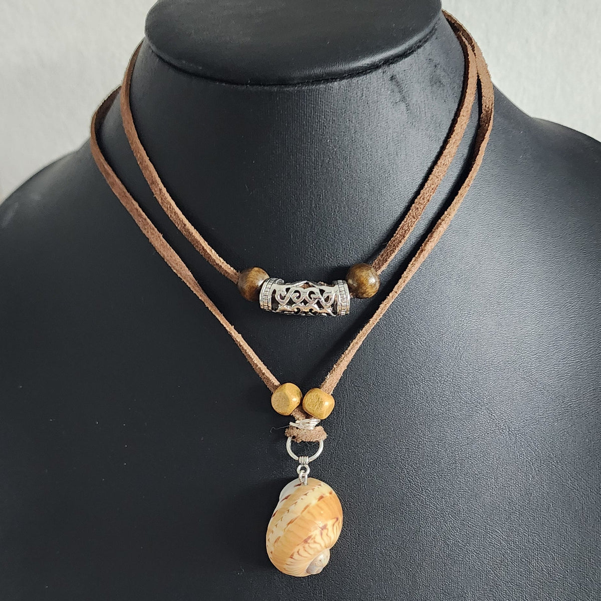Colorful Moon Snail Shell adjustable choker necklace on brown faux suede cord