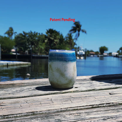 Ocean Fade Hook & Tumble™ 12oz wine tumbler on dock – hand-painted blue to white fade with real fishing hooks and sand handmade South Florida