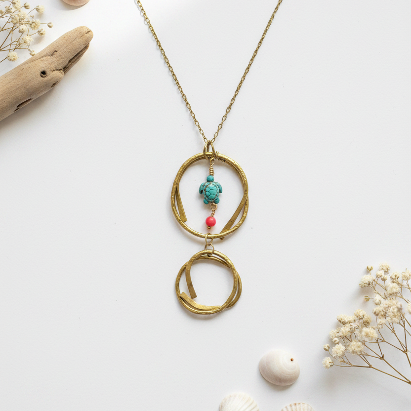 Handmade brass turtle pendant necklace with hammered double-circle design and 17 inch chain