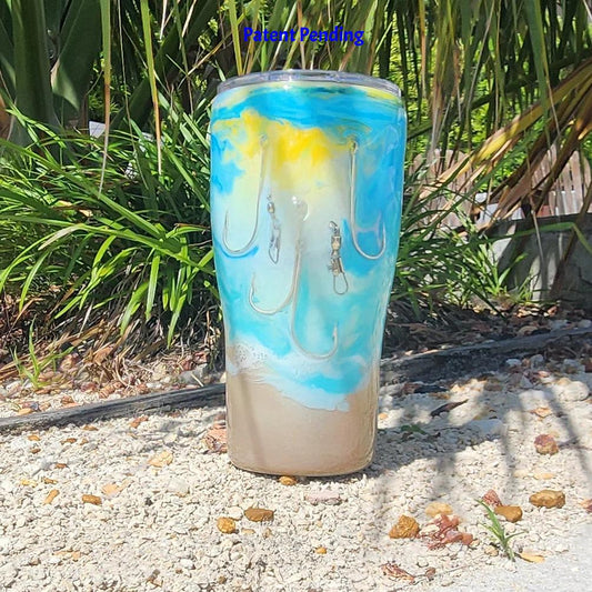 Turquoise ocean wave fishing hook tumbler 20oz front view, real metal hooks and barrel swivels, sandy shimmer base, Hook & Tumble™ Patent Pending