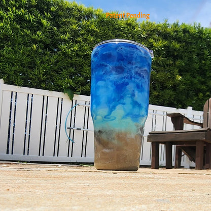 Back view of Crystal Shore Deep 30oz fishing tumbler showing full sandy shore to crystal turquoise to deep cobalt blue ocean design. Hook & Tumble™ by SoFlo Boho Boutique, handcrafted in South Florida, Patent Pending.