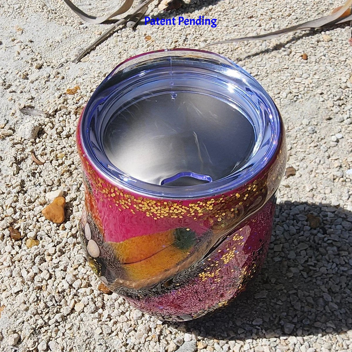 Magenta boho Saltwater Sips™ 12oz wine tumbler top view, snap-on splash proof lid, Patent Pending
