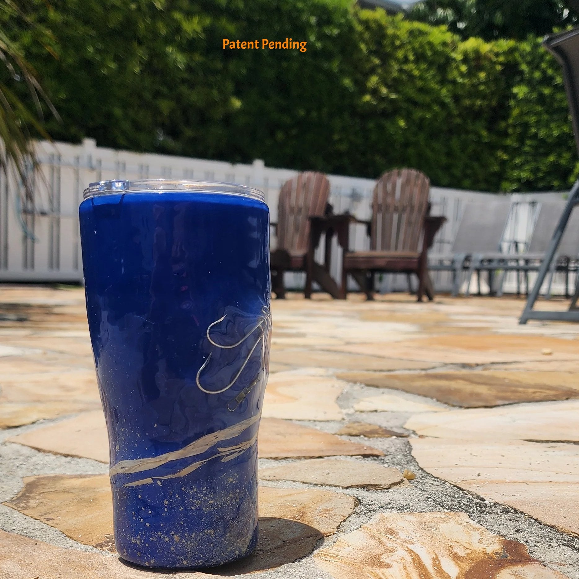 Handmade 20oz Blue Ink fishing hook tumbler with real saltwater hooks, barrel swivel and natural raffia, Hook & Tumble coastal drinkware