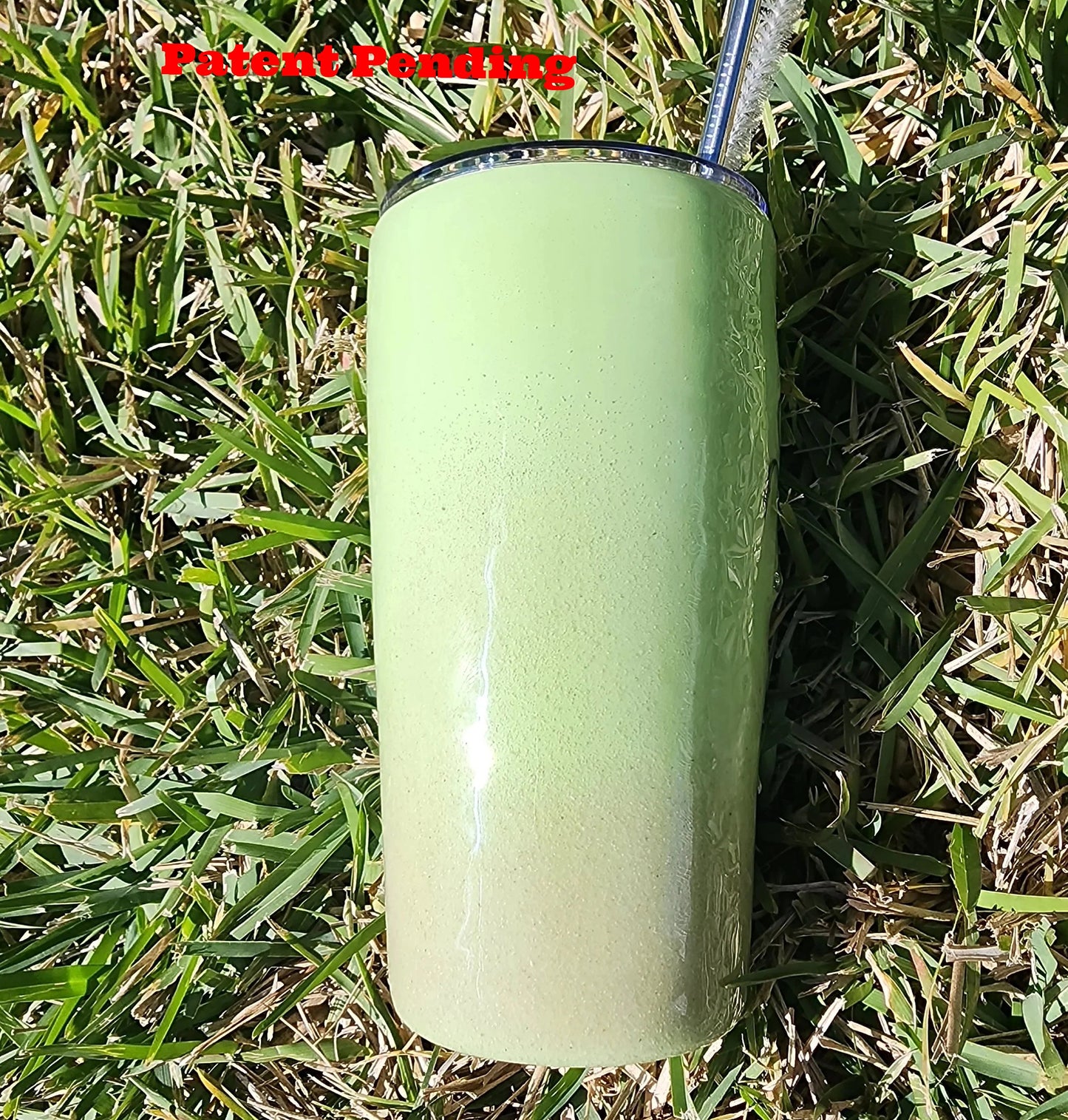 Epoxy resin fish hook tumbler showing real sand texture and embedded fishing hooks