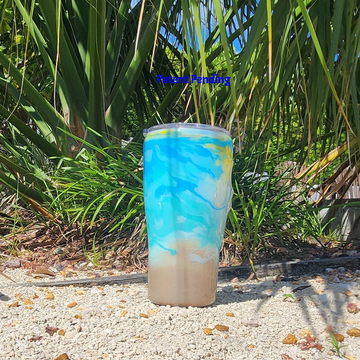 Turquoise ocean wave fishing hook tumbler 20oz back left view, seafoam and turquoise design, Hook & Tumble™ Patent Pending