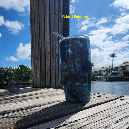 Hook & Tumble Blue Lagoon coastal tumbler on dock with blue sky, handmade fishing drinkware USA