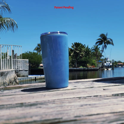 Left side view Blue Water Hook & Tumble™ 20oz blue tumbler on weathered dock South Florida