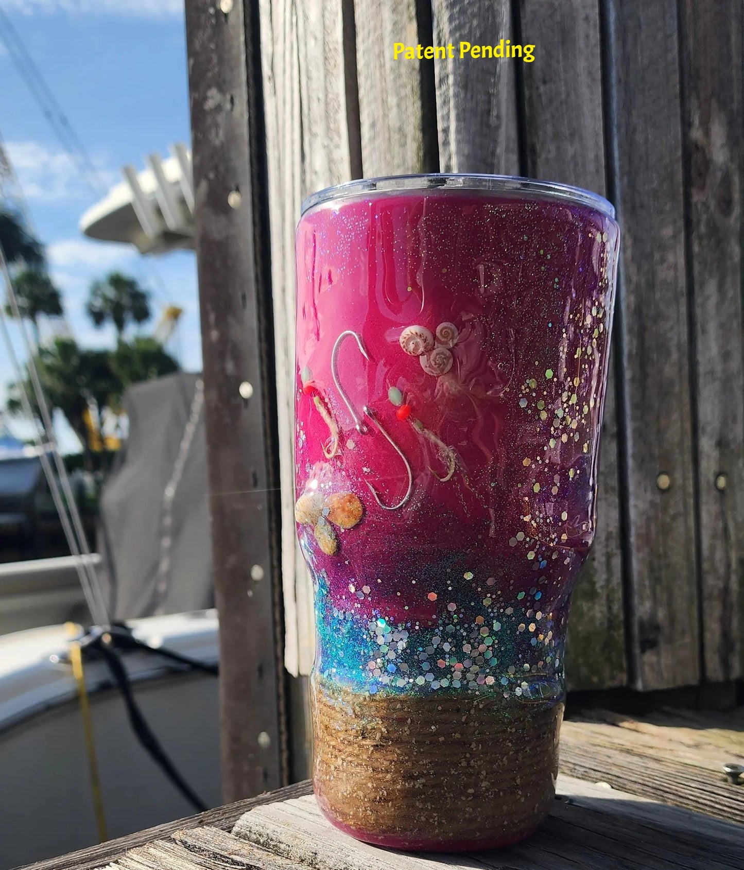 close up side view of details in 30oz magenta tumbler