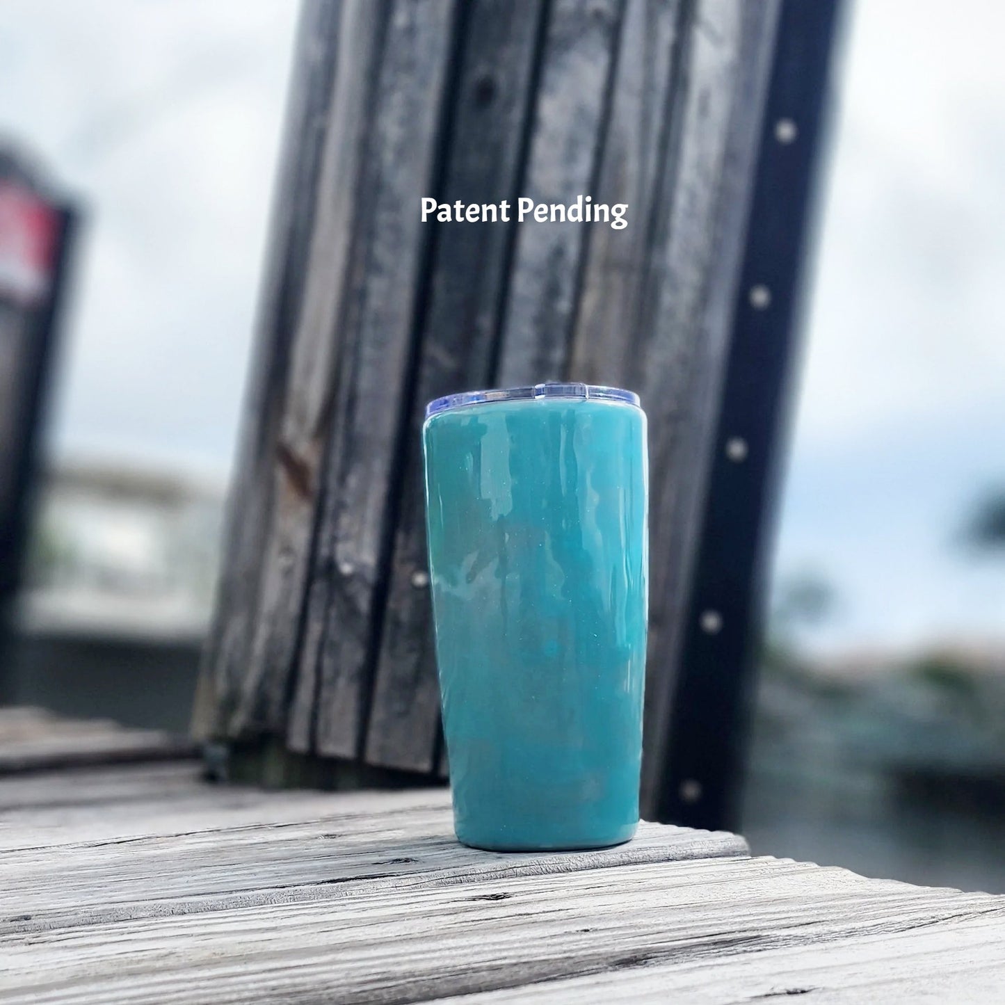 Back view of turquoise shimmer coastal tumbler, tapered shape, insulated stainless steel