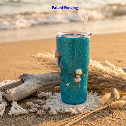 Lid top-down view of a 20oz insulated tumbler on sand surrounded by seashells