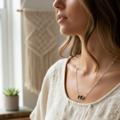 Sterling silver smoky quartz necklace styled with heart link chain