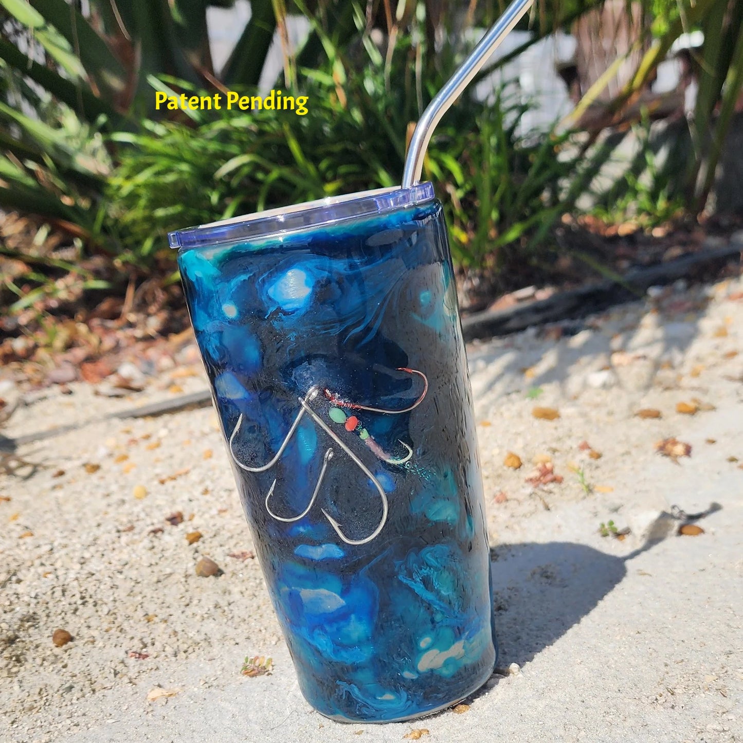 Blue Lagoon fishing hook tumbler detail shot showing glow shrimp hook and real metal hooks, Hook & Tumble