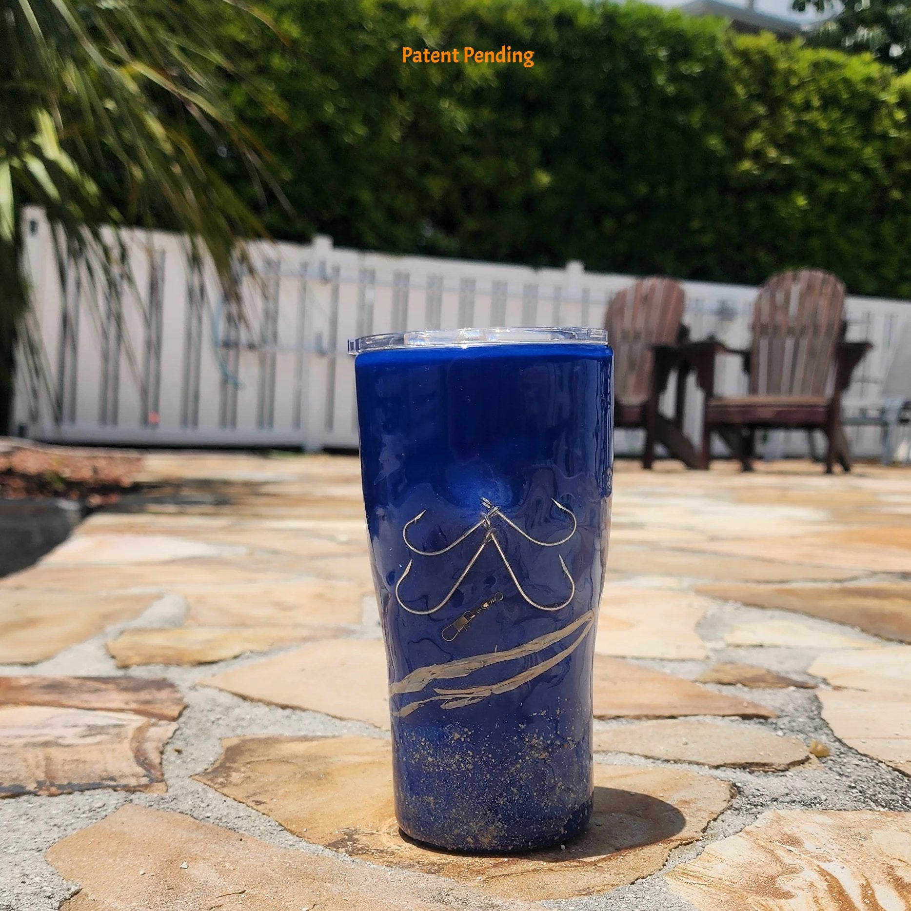 Handmade 20oz Blue Ink front side fishing hook tumbler with real saltwater hooks, barrel swivel and natural raffia, Hook & Tumble coastal drinkware